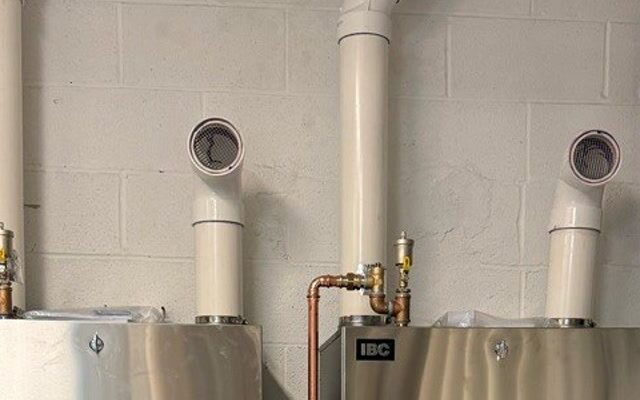 Two new IBC boilers installed for a proactive boiler replacement in Belle Haven, Greenwich, CT.