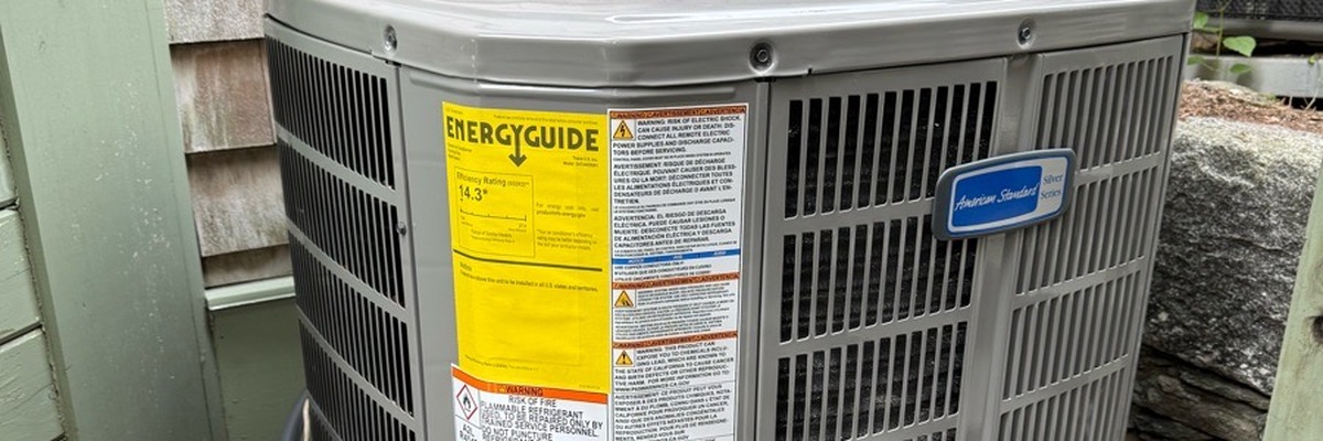 American Standard Silver Series outdoor condensing unit showing brand badge at East Putnam Avenue in Cos Cob, Greenwich, CT