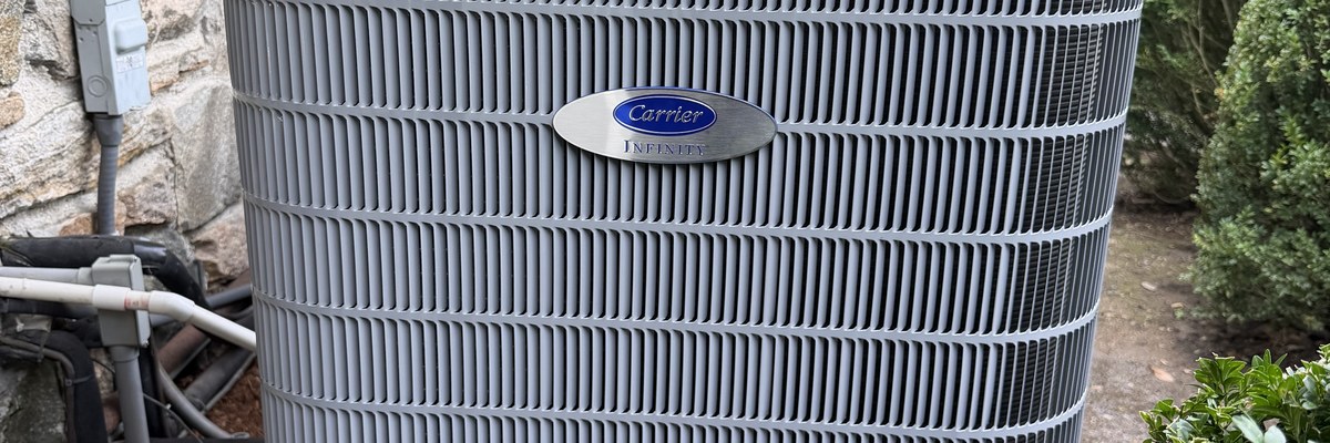 Carrier Infinity outdoor unit on a new pad at MacPherson Drive in Greenwich, CT